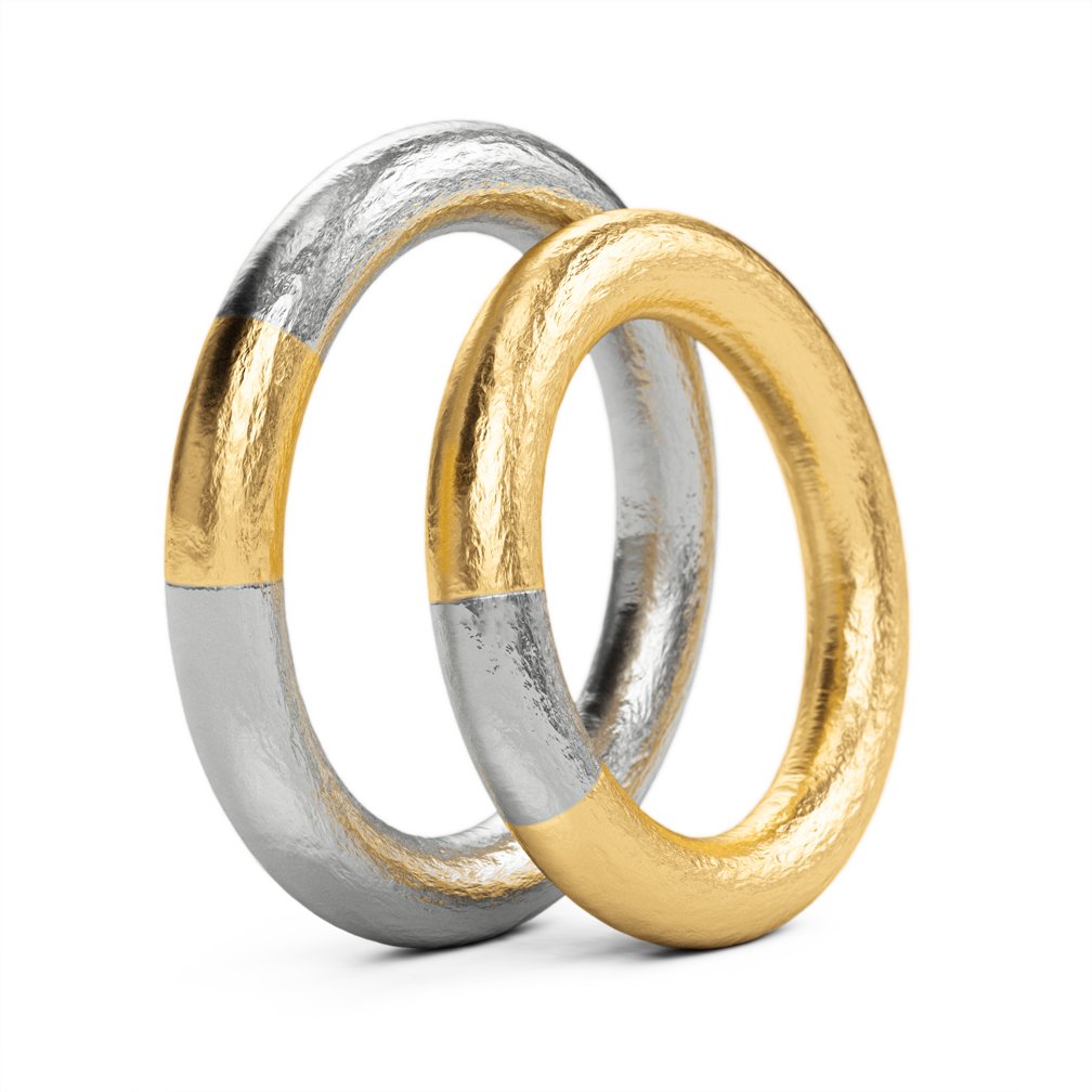 Sold at Auction: 18 kt gold NIESSING brilliant-tension ring